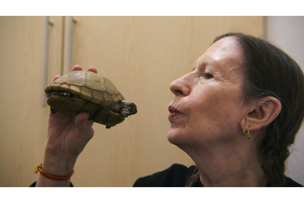 Meredith Monk with her beloved tortoise Neutron at a reptile hospital in New York. 