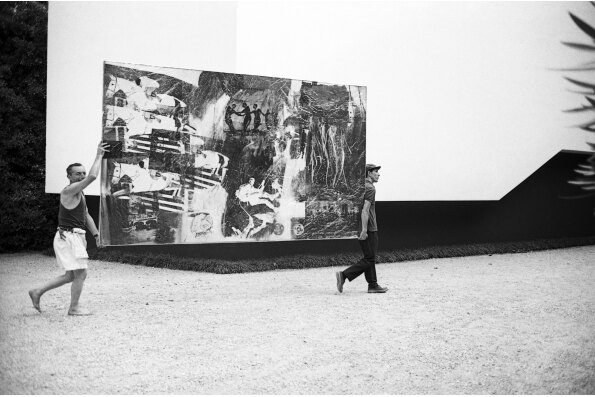 Transporting Robert Rauschenberg’s Express at the XXXII International Biennale of Art Exhibition, Venice, 1964, as seen in TAKING VENICE, a film by Amei Wallach. A Zeitgeist Films release in association with Kino Lorber. Photo Ugo Mulas.