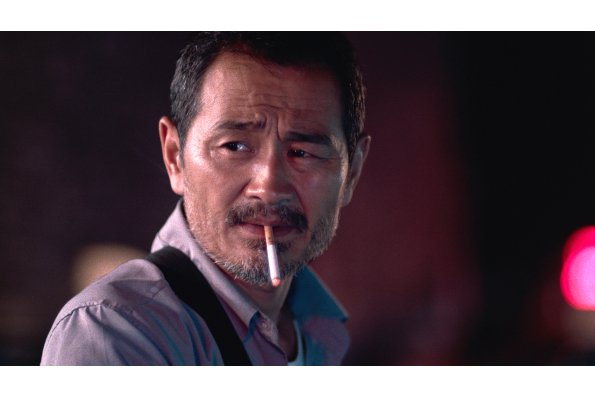 Chen Gang as taxi driver Lao Shi in OLD STONE, a film by Johnny Ma. A Zeitgeist Films release.