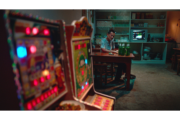 Chen Gang as taxi driver Lao Shi in OLD STONE, a film by Johnny Ma. A Zeitgeist Films release.